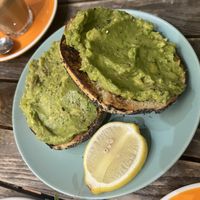 Poppy seed bagel with smashed avo  at Oh My Days in Glebe