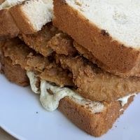 This sandwich was a joke. Nearly 6” of burnt vegan chicken and some sauce and pickles. Absolutely no way to eat this without cutting into smaller pieces or I was to unhinge myjaw at Oh My Days in Glebe