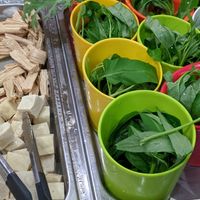 Greens and tofu at K & L 98 HotPot in Boynton Beach