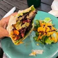 Super good falafel wrap with juicy veggies (sorry took picture after started eating) at The Greenhouse in Vientiane