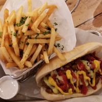 Sonoran style hot dog with parsley fries! at Earth Plant Based in Phoenix