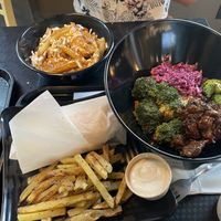 Poutine, general copper bowl, branchero burrito, side of fries with aioli  at Copper Branch - Stanley in Montreal