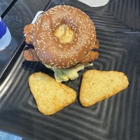 ultimate bagel sandwhich & hash browns  at Copper Branch - Stanley in Montreal