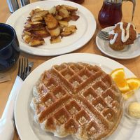 À la carte vegan breakfast: waffle, breakfast potatoes, seasonal mini muffin (pumpkin spice) & a bottomless cup of joe. Excellent all around. at Olivia's Organic Cafe in Burnsville