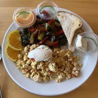 Tofu scramble with sautéed greens and gluten free toast   at Olivia's Organic Cafe in Burnsville