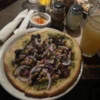 Their “Vegan Pie” as shown in the picture is served on their gluten free crust (which is vegan but their normal crusts are also vegan).   at Alibi Room in Seattle