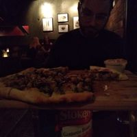 Their vegan pizza was a must have! at Alibi Room in Seattle