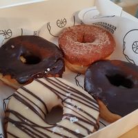 Chocolate, cinnamon/sugar, chocolate/peanut butter at Boneshaker Doughnuts in Paris