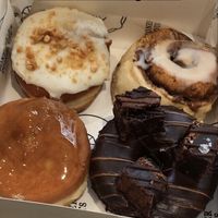 Fluffernutter (peanut butter custard) / cinnamon roll / Pumpkin crème brûlée (pumpkin filling) / Brownie at Boneshaker Doughnuts in Paris