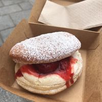 with vanilla cream and strawberry   at Boneshaker Doughnuts in Paris