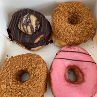 Box of 4 donuts at Boneshaker Doughnuts in Paris