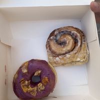 Donut of the month and cinnamon roll  at Boneshaker Doughnuts in Paris