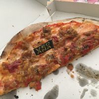 Half of our espencat (eggplant and pepper) pizza with vegan cheese.  at Volare in Gandia