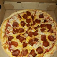 Large pepperoni and Cheese vegan pizza! It's so yummy!!! at New Ethic in Rochester