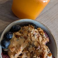 Half order acai bowl and fresh carrot, orange and ginger juice at Les Filles in London