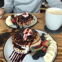 Les filles pancakes - so good! Plus a huge oat milk latte! at Les Filles in London