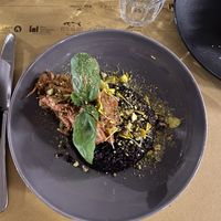 vegan&gf black rice w/ jackfruit topped w/ basil & pistachio🤌 at Ginger - Pantheon in Rome