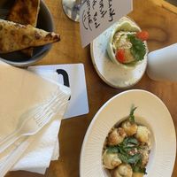 Ooo, sideways toast, hummus and garlic knots!  at Journey Cafe in Kailua Kona