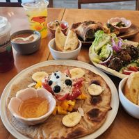Barbecue Sourdough Pocket,  Rainbow pita, pancake , dirty chai late and  pink aloha at Journey Cafe in Kailua Kona