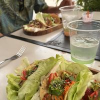 Epic Japanese bbq tacos in front, epic feisty tacos in back. So good!  at Journey Cafe in Kailua Kona
