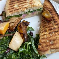 Half “tuna” sandwich, half vegan grilled cheese paired with root veggie salad   at Larry's Market in North Vancouver