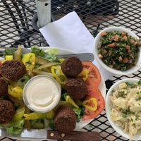 Falafel combo comes with 2 veggie sides (I chose tabouleh and artichokes). Not pictured: Basket of warm pita bread. This was easily enough food for 2 people!  at Cedar's Mediterranean Grill in Stroudsburg