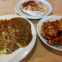 2 curries with rice, vegan onion baji and vegan Roti Wrap (highly recommend) at The Indian Kitchen in West End