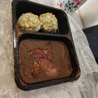 Goulash with bread dumplings at Landia in Vienna