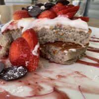 Strawberry pancakes, very fluffy at Helgas Pancake House in Cairns