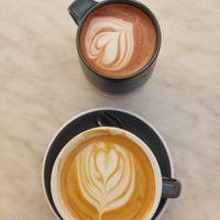 Hot oat milk chocolate and oat cappucino. at Café Tulipe in Avignon