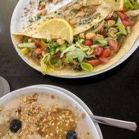 Asian burrito and the porridge :) at Cafe M in Coburg