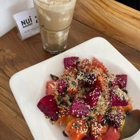 Coffee with coconut ice and foam + super fruit salad  at Nui Bakery in Koh Tao