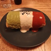 Chorizo Burrito with three different sauce toppings at Jajaja Mexicana - West Village in New York City