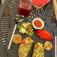 Breakfast - avocado toast and smoothie  at Ramayana Cafe in Sinaia