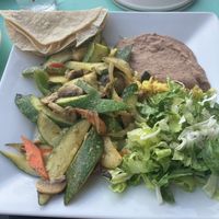 A really cute place on 9th Street in Durham with lots of personality.  Indoor and outdoor seating.  Food tasted like it had been precooked for a while and heated up; not freshh  at Blue Corn Cafe in Durham