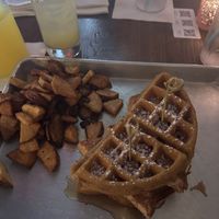 Vegan Chickn and waffles with a side of home fries  at Kreggers At Hand in Richmond