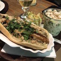 Vegan vegan dog with a creamy mushroom sauce topping, the glass noodle salad with lime dressing and a Mexican coleslaw  at Felis in Essen