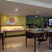 Also nice seating area outside, a relaxing environment! at The Donut Cafe in Chiang Mai