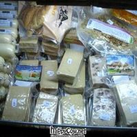 The refrigerated section of the small shop... vegan cheeses and meats. at Loving Hut in Paris