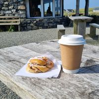 Cinnamon bun and coffee at The Temple Cafe in Isle Of Harris