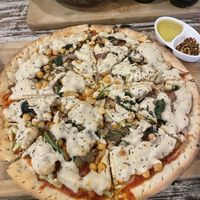 Vegan pizza with cashew cheese   at Little Windows in Pokhara