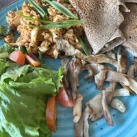 Vegan breakfast with tofu scramble, mushrooms and buckwheat flatbread   at Little Windows in Pokhara