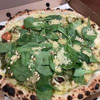 Vegan pesto pizza with spinach, pine nuts and vegan cheese. Really good!  at Pazzi in Stockholm