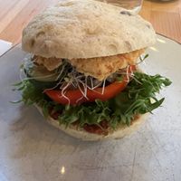 Gluten-free vegan bread roll with custom spreads and toppings. Delicious!  at Godt Brød in Stavanger