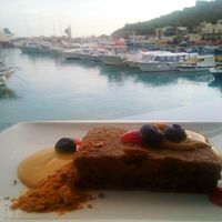 The most divine cake I've had on the island - Carrot Cake with Caramel Sauce and a dusting of Caramel Powder, Pumpkin Custard and Blueberries. Vegan and Gluten-Free. 10euro at One80 in Mgarr