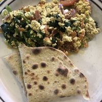 Vegan scramble with veggies and bread - full of flavor  at Annapurna's World Vegetarian Cafe - 4th St in Albuquerque