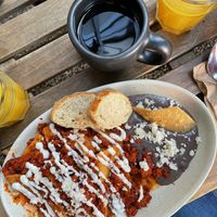 chilaquiles rojos con chorizo  at Café Vegetal in Mexico City