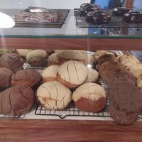 Concha de vanilla, cookies, donuts .. abajo habían los postres ! at Café Vegetal in Mexico City