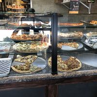 Pizza by the slice is plentiful  at 3 Brothers of Rockville Center in Rockville Centre