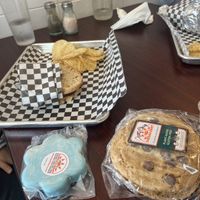 Heavily modified BBQ burger in background (to suit a child’s palate) and some goodies in the foreground!  at Cosmic Veggies in Anacortes